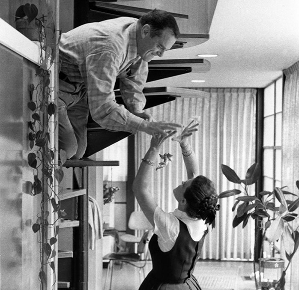 A playful moment for the Eames at home, c. 1970. Image courtesy of KPBS TV. 