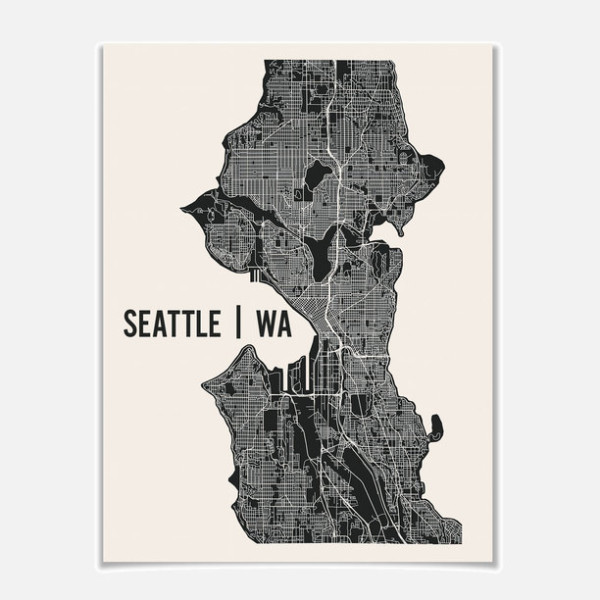 Map of Seattle, available for purchase at Fab. I-5 is the widest white line pictured, and it divides the eastern and western halves of the city.